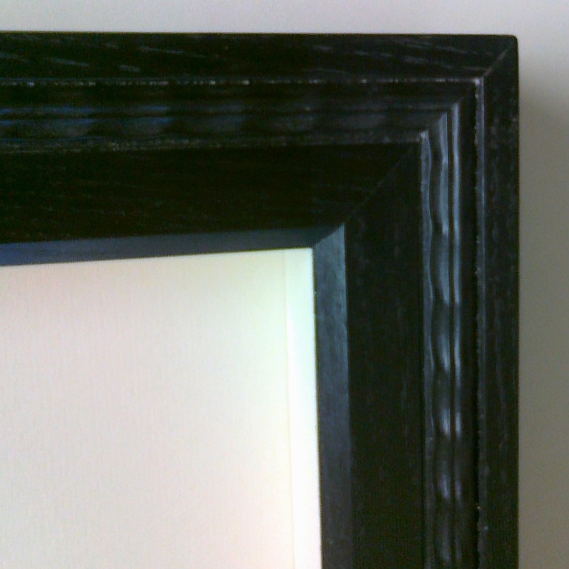 Cornice nera intarsiata